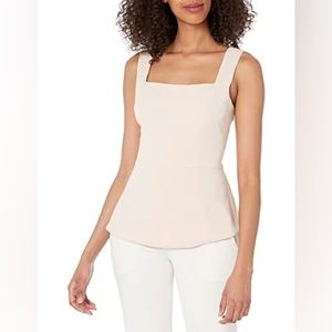 FINAL SALE✨

BCBGmaxazria fit and flare tie front back slit peplum top 🤍